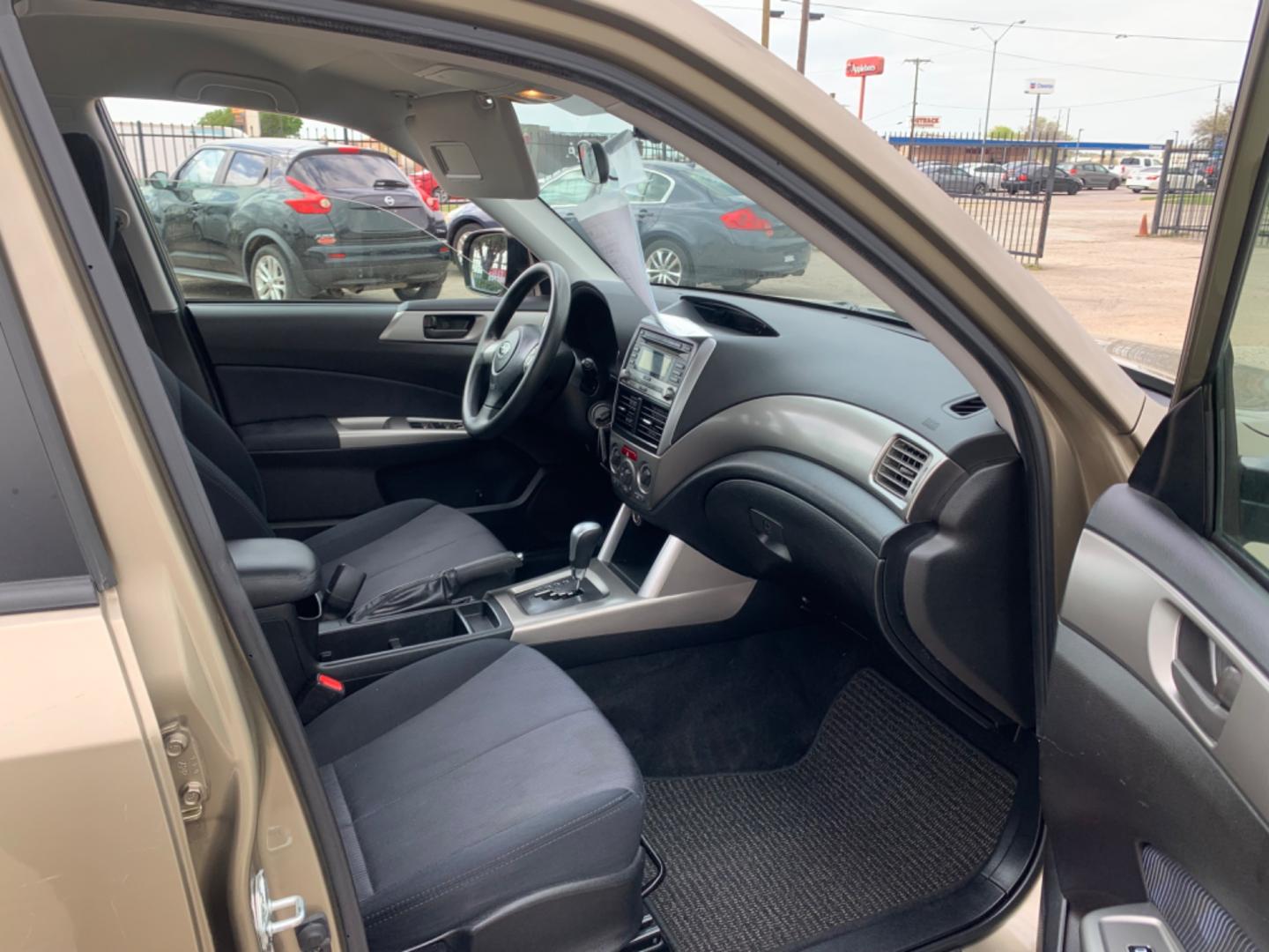 2009 Gold /Black Subaru Forester (JF2SH61649H) with an 2.5L FI SOHC 150 CID engine, AUTOMATIC transmission, located at 1830 North Belt Line Road, Irving, TX, 75061, (469) 524-0199, 32.834373, -96.993584 - Photo#11